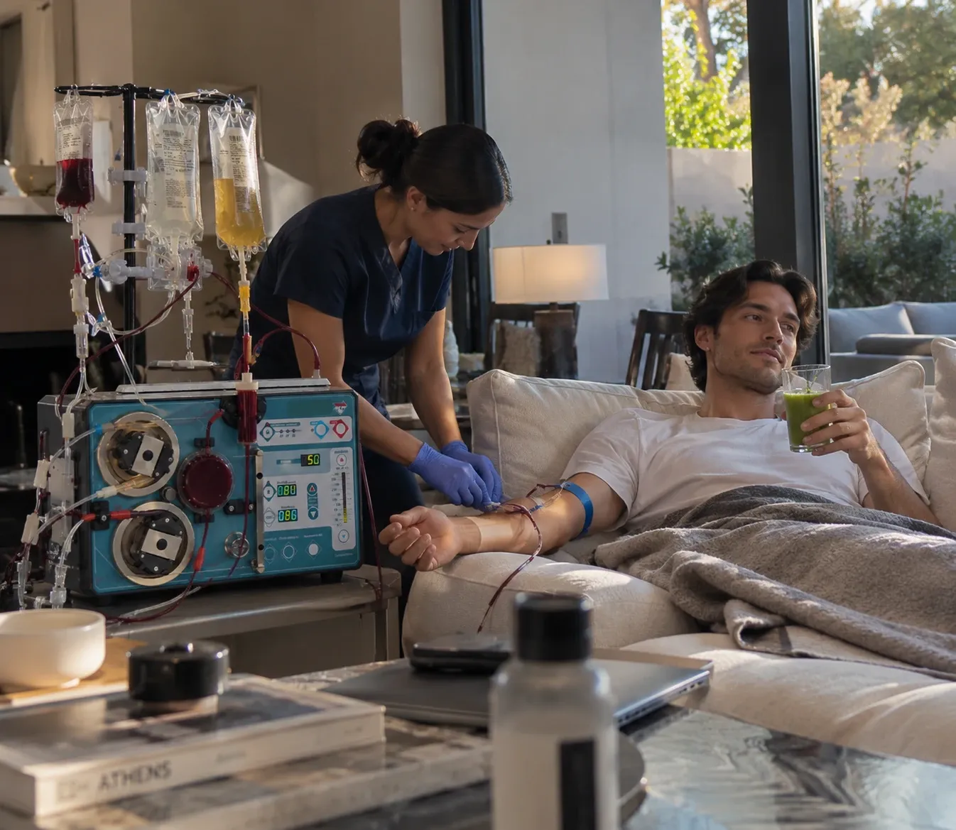 A nurse attends a patient on GEMMA at home.